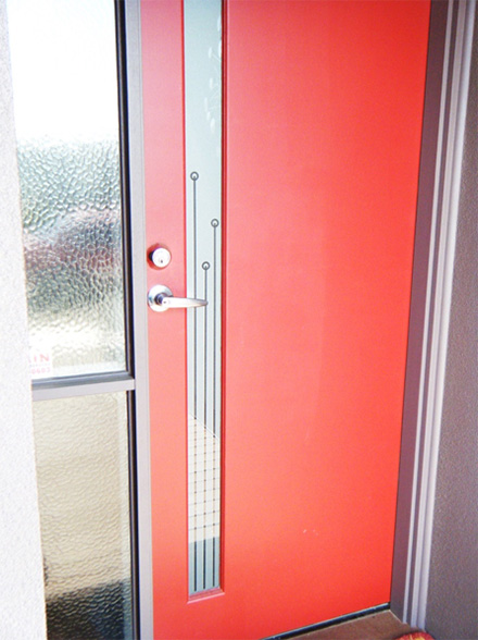 Red door with DIY frosted glass film applied