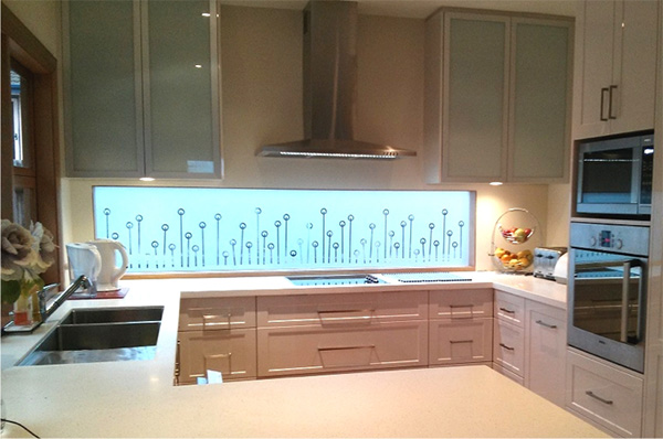 Kitchen with DIY frosted glass film applied to window above sink