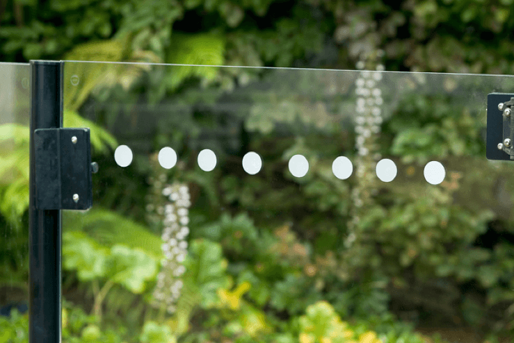 Close up of decorative frosted window decal dots